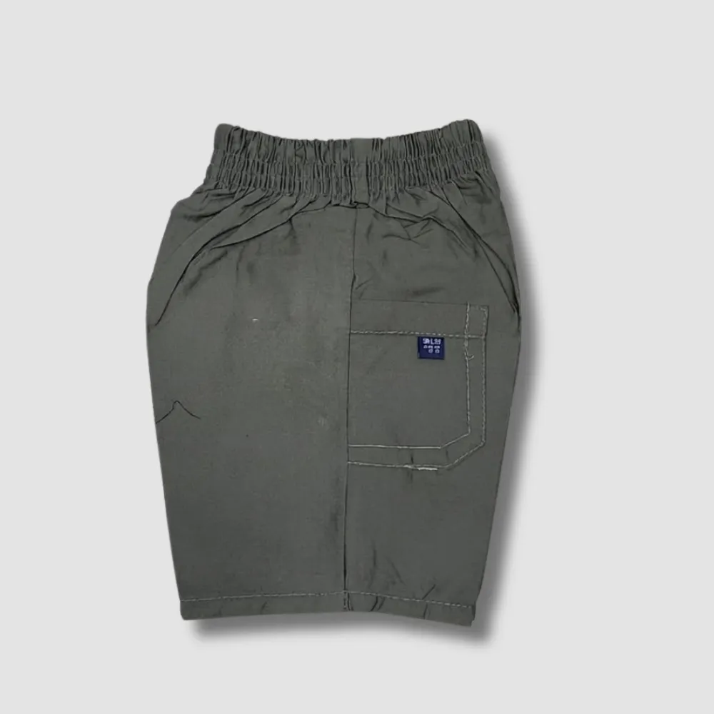 Dark green cargo shorts with a drawstring waist and two large pockets on the sides, one of which has a small logo patch.